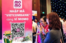Kích thích khách hàng bỏ tiền mặt, MoMo và Vietcombank tung khuyến mãi khủng