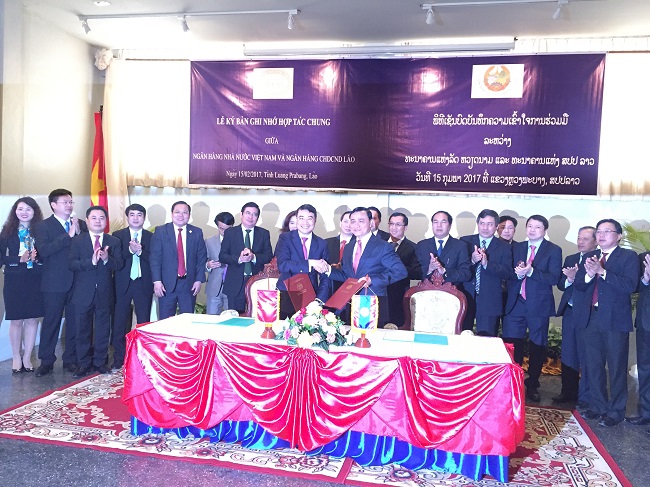 Chủ tịch HĐQT Vietcombank tháp tùng Thống đốc tham dự Hội nghị song phương lần thứ 6 giữa NHNN VN và NHCHDCND Lào